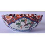 A JAPANESE EDO PERIOD PORCELAIN BOWL, painted with birds in a landscape. 24 cm wide.