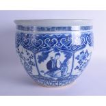 A LARGE 19TH CENTURY CHINESE BLUE AND WHITE PORCELAIN JARDINIERE Qing, painted with figures seated