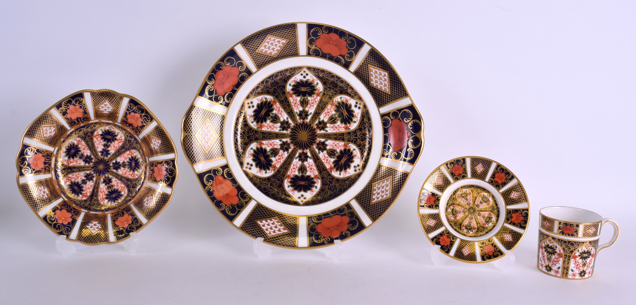 A ROYAL CROWN DERBY IMARI TWIN HANDLED DISH together with a cup, saucer & another. Largest 22 cm