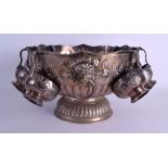 A LARGE EARLY 20TH CENTURY SILVER PLATED PUNCH BOWL with matching hanging cups, decorated in the