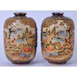 A PAIR OF EARLY 20TH CENTURY JAPANESE BLUE GROUND SATSUMA POTTERY VASES, painted with panels of