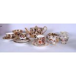 A ROYAL CROWN DERBY TEA POT, sugar bowl, cream jug together with other porcelain. (qty)