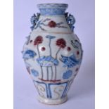 A 20TH CENTURY CHINESE BLUE AND WHITE PORCELAIN VASE, decorated with swimming fish amongst the