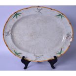 A LARGE ENGLISH AESTHETIC MOVEMENT PORCELAIN PLATTER, decorated with birds and foliage. 46 cm x 54