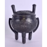 A LATE 19TH CENTURY CHINESE EXPORT TWIN HANDLED SILVER CENSER AND COVER decorated with dragons and