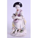 A GOOD 18TH CENTURY BOW FIGURE OF A GIRL modelled as a girl holding a bowl of grapes. 13 cm high.