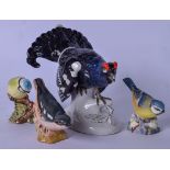 A WEISS KUHNERT & CO PORCELAIN FIGURINE OF A BLACK GROUSE, together with two Beswick porcelain birds