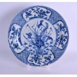 A 17TH/18TH CENTURY CHINESE BLUE AND WHITE PORCELAIN PLATE Kangxi, painted with floral sprays. 21 cm