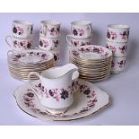 A PARAGON PORCELAIN TEA SERVICE, in the "Michelle" pattern. (qty)