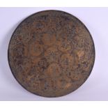 AN EARLY MIDDLE EASTERN PERSIAN ENGRAVED BRASS PLAQUE Khorosan, decorated all over with figures in