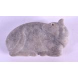 A 19TH CENTURY CENTRAL ASIAN CARVED STONE BUFFALO of flattened form. 8.5 cm x 4.5 cm.