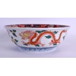A MID 19TH CENTURY JAPANESE MEIJI PERIOD IMARI PORCELAIN BOWL painted with dragons, phoenix birds
