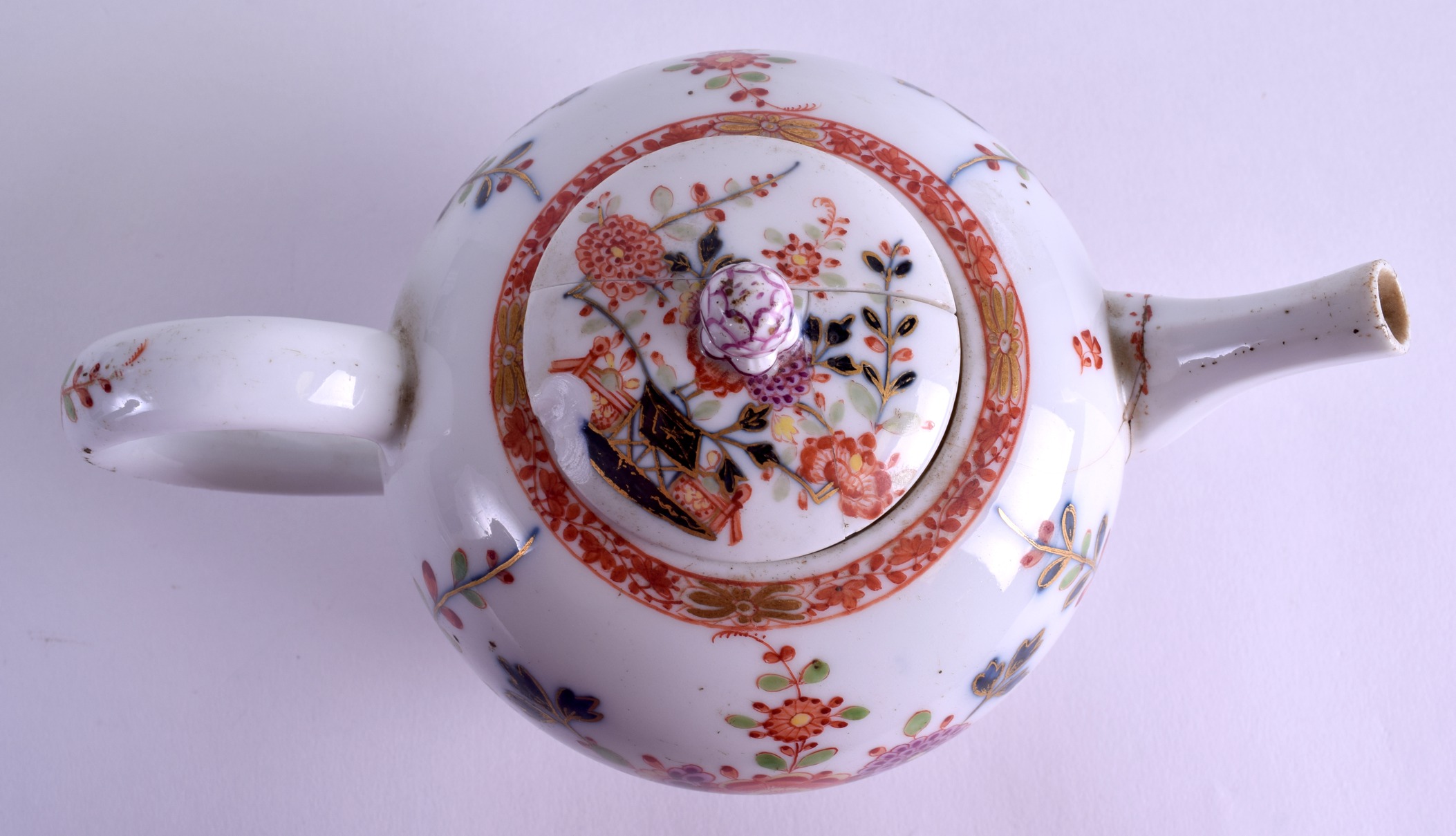 AN 18TH CENTURY MEISSEN PORCELAIN TEAPOT AND COVER painted with trees and foliage. 18 cm wide. - Image 3 of 4