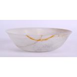 A 19TH CENTURY CHINESE CARVED WHITE JADE BOWL of almost translucent form. 13 cm diameter.