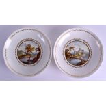 A PAIR OF 18TH CENTURY DERBY PLATES painted with scenes of the River Trent & a view of Italy,