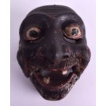 AN 18TH CENTURY JAPANESE EDO PERIOD CARVED AND LACQUERED MASK formed as a toothless male with