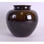 A JAPANESE STUDIO POTTERY BULBLUS VASE with faintly incised double rim to the top. 18 cm x 16 cm.