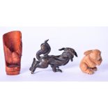 A JAPANESE CARVED WOODEN FIGURE OF A RABBIT, together with a bronze beast and another carving. (3)