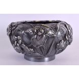 A 19TH CENTURY JAPANESE MEIJI PERIOD EMBOSSED SILVER BOWL decorated with flowers and vines in