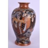 A LATE 19TH CENTURY JAPANESE MEIJI PERIOD SATSUMA VASE painted with immortals within landscapes.