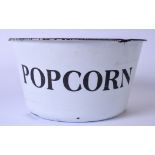 A VINTAGE ENAMEL POPCORN BOWL, white with black print. 13 cm x 25 cm.