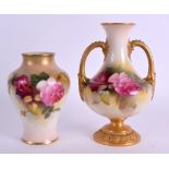 A ROYAL WORCESTER TWIN HANDLED VASE C1918 painted with roses, together with a similar inverted