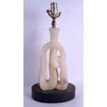 AN UNUSUAL EARLY 20TH CENTURY EUROPEAN CARVED ALABASTER LAMP upon an ebonised wooden base. 35 cm