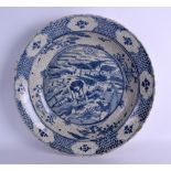 A LARGE 17TH CENTURY CHINESE BLUE AND WHITE KRAAK POTTERY DISH Qing, painted with a deer within an