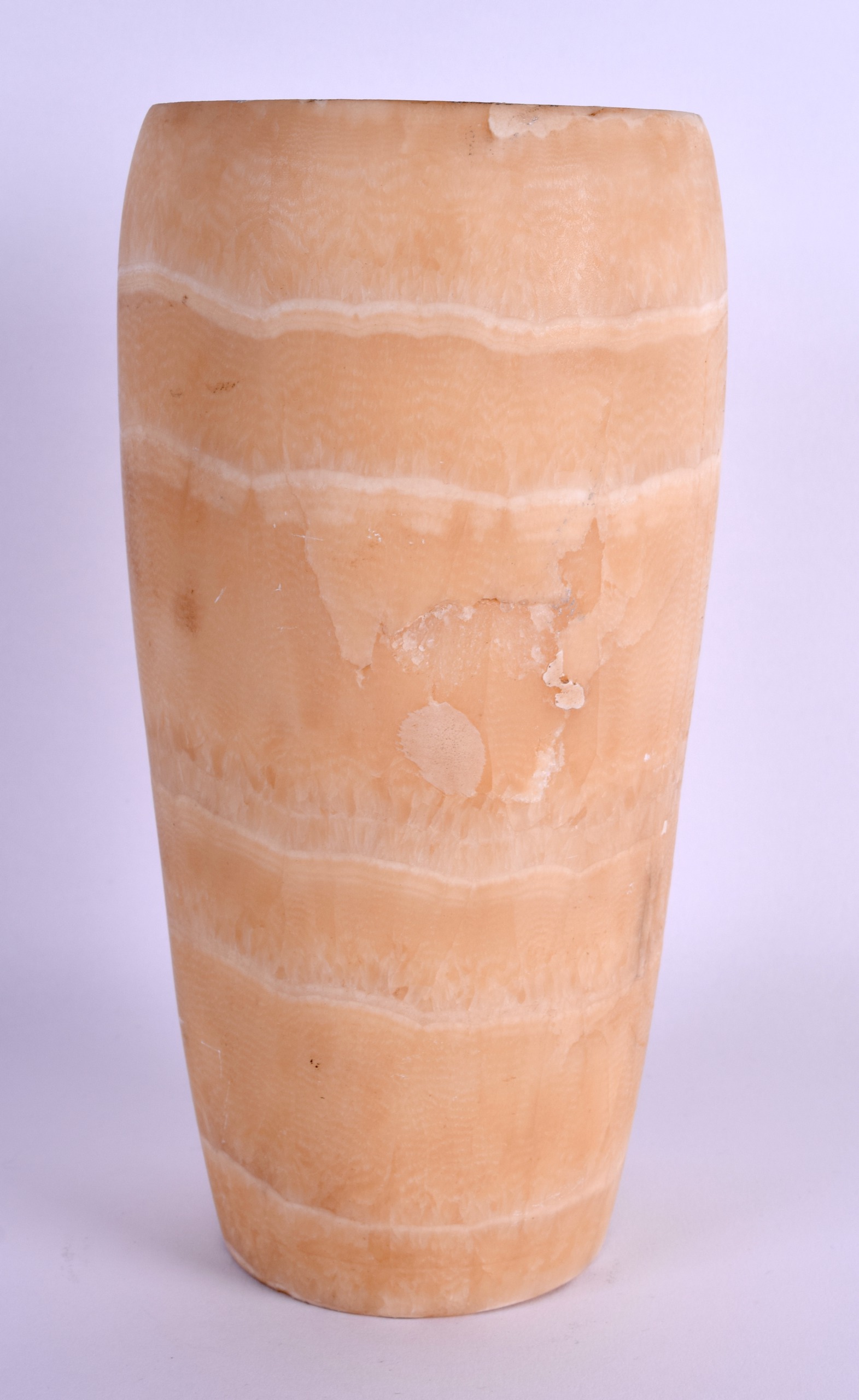 AN EGYPTIAN CARVED ALABASTER CANOPIC CARVED JAR incised with hieroglyphics. 24 cm high.