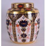 A ROYAL CROWN DERBY IMARI GINGER JAR AND COVER Pattern 1128. 11.5 cm high.