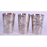 A SET OF THREE 19TH CENTURY CHINESE EXPORT SHOT GLASSES decorated with bamboo. 120 grams. 12 cm