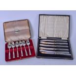 A CASED SET OF SILVER PLATED SPOONS, together with a cased set of butter knives and other loose