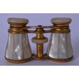 A PAIR OF EARLY 20TH CENTURY FRENCH MOTHER OF PEARL OPERA GLASSES, with bronze mounts. 10.5 cm