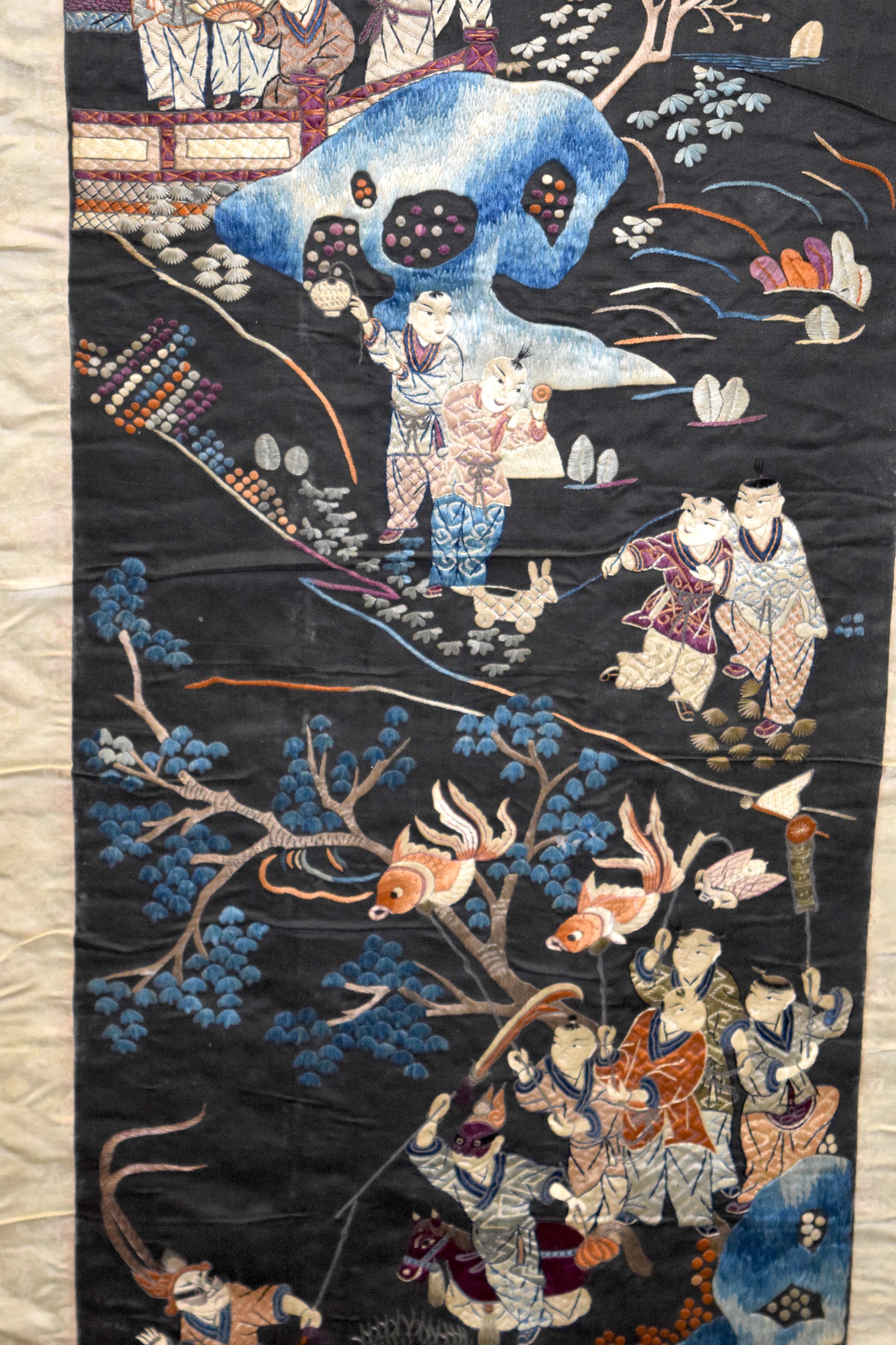 A GOOD 19TH CENTURY CHINESE SILKWORK HANGING SCROLL Qing, decorated with figures within landscapes - Image 4 of 5