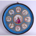 A LARGE 19TH CENTURY FRENCH SEVRES PORCELAIN CHARGER painted with Royalty and female portraits