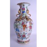 A LARGE 19TH CENTURY CHINESE FAMILLE ROSE BALUSTER VASE Qing, painted with figures, fish and insects