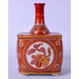 A JAPANESE MEIJI PERIOD KUTANI PORCELAIN BOTTLE NECK SQUARE FORM VASE, decorated with gilt panels of