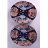 A LARGE PAIR OF 19TH CENTURY JAPANESE MEIJI PERIOD FAN SHAPED DISHES painted with flowers and vines.