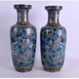 A GOOD PAIR OF 18TH/19TH CENTURY CHINESE CLOISONNE ENAMEL VASES Qianlong/Jiaqing, decorated with