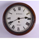AN ANTIQUE BRITISH RAILWAYS 3387 OAK WALL CLOCK with white dial and black numerals. 30 cm x 35 cm.