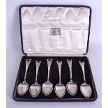 A FINE SET OF SIX DANISH SILVER AND ENAMEL SECCESSIONIST MOVEMENT SPOONS in the manner of