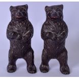 A PAIR OF IRON MONEY BOXES IN THE FORM OF STANDING BEARS, probably from the 1960's. 16.5 cm high.