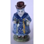 AN UNSUAL FAIENCE POTTERY TOBY JUG, in the form of a standing female. 21 cm high.