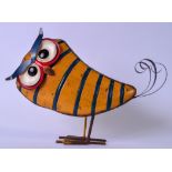 A LARGE & UNSUAL ABSTRACT METAL SCULPTURE OF AN OWL, formed standing with its head tilted to one