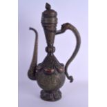 A 19TH CENTURY CHINESE SINO TIBETAN COPPER EWER AND COVER formed with a scaly fish handle. 48 cm x