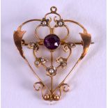 AN ART NOUVEAU 9CT GOLD PEARL AND AMETHST PENDANT.