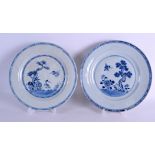 A PAIR OF 18TH CENTURY CHINESE BLUE AND WHITE PLATES Qianlong, painted with birds within landscapes.