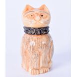 A CHINESE CARVED BONE SNUFF BOTTLE IN THE FORM OF A CAT, modelled seated. 4.5 cm high.