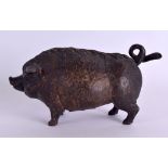 A RARE MID 19TH CENTURY CAST IRON NOVELTY TABLE BELL in the form of a chubby pig, his nose and