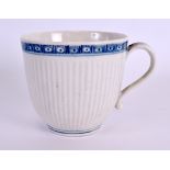 AN 18TH CENTURY WORCESTER RIBBED COFFEE CUP painted with a single cell border upon a ribbed body.
